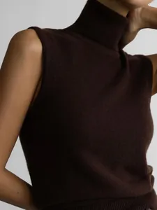 Close-up detail of a high-quality dark brown sleeveless knit vest with soft texture