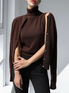 Detail view of a brown turtleneck knit vest and matching button-up cardigan set