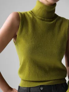 Close-up of a vibrant lime green sleeveless turtleneck knit vest with soft ribbed texture