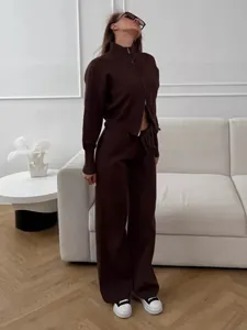 Elegant dark brown knit set featuring a double zipper top and wide-leg trousers
