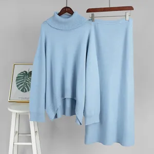 Elegant light blue two-piece knit set with a cozy turtleneck sweater and a matching midi skirt