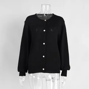 Elegante schwarze leichte Strickjacke mit einreihigen weißen Knöpfen für Frauen