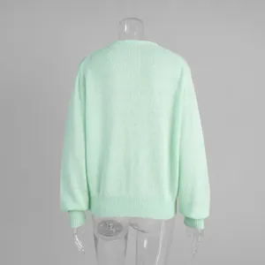 Rückansicht eines mintgrünen leichten Strick-Cardigans in süßer Bonbonfarbe für Damen