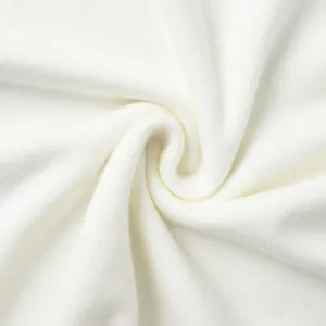 Macro view of soft white knitted fabric texture for women's autumn sweater set