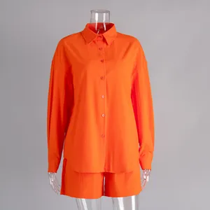 Bright orange cotton long-sleeved shirt and matching shorts set for summer casual wear