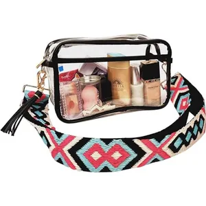 Transparent PVC bag with colorful woven strap showing interior storage capacity