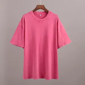 Detail view of pink acid-washed vintage oversized cotton t-shirt with crew neck