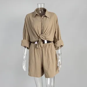 Women's khaki summer lounge set featuring a long-sleeve button-down shirt and matching shorts
