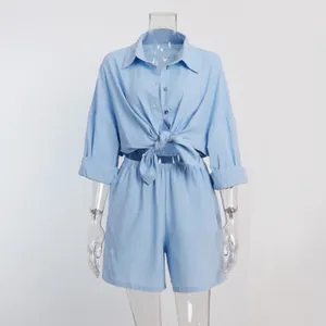 Sky blue two-piece summer set with tie-front long sleeve shirt and relaxed fit shorts