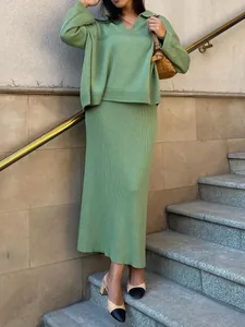 Fashionable green V-neck knitted sweater and ribbed maxi skirt two-piece set for women