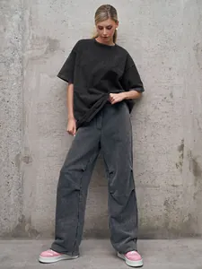 Full body detail view of washed distressed oversized grey t-shirt and pants set