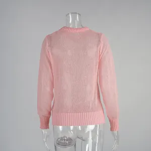 Detailed back view of pink semi-sheer crew-neck mohair sweater showing fine knit texture