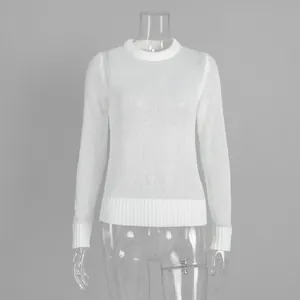 Close-up of semi-transparent white mohair knit sweater with ribbed crewneck details