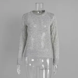 Detailed view of gray mohair crewneck knit sweater with semi-sheer texture