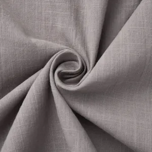 Macro detail view showing the breathable grey cotton fabric texture for leisure wear.