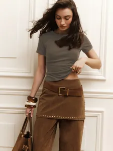 Elegant slim-fit gray crop top t-shirt presented on a model for a chic summer look.