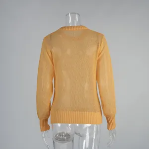 Back view of a yellow semi-sheer mohair crew neck pullover knit sweater for women