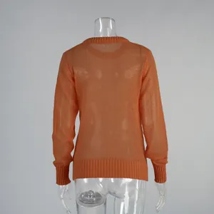 Back view of orange semi-sheer mohair knit sweater on transparent mannequin