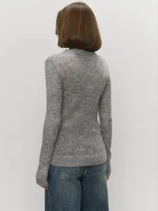 Back view of a grey semi-sheer mohair knit sweater showing the delicate texture detail.