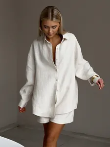 Full detailed view of women's relaxed cream cotton long-sleeve shirt and shorts set.