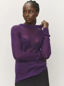 Detailed view of a premium purple semi-transparent mohair knit sweater on a model.