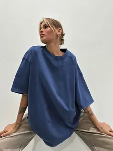 Close-up detail of navy blue washed distressed cotton T-shirt with relaxed oversized fit