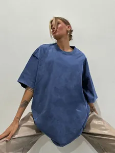 Detailed view of an oversized washed blue t-shirt with a vintage finish