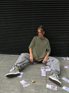 Oversized olive green washed vintage T-shirt for a relaxed street style look