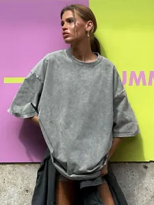 Oversized vintage grey acid wash cotton t-shirt with a relaxed fit and crew neck design