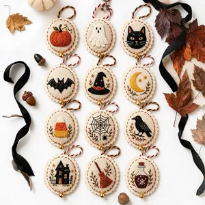 Detailed collection of 12 Halloween embroidered ornaments featuring spooky ghost and pumpkin designs