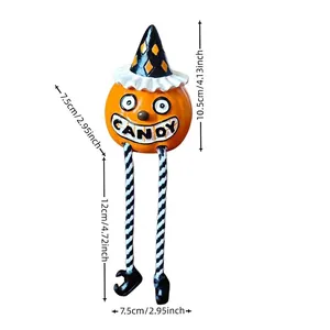 Detailed dimensions showing a Halloween pumpkin figurine with witch hat and candy sign