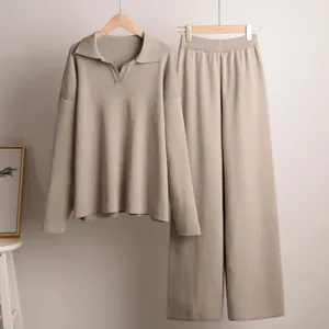 Detailed display of oatmeal knit two-piece set featuring a Polo pullover and wide-leg trousers
