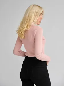 Detailed back view of a slim fit pink ribbed mock neck sweater worn by a blonde model.