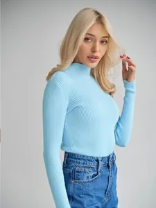 Detail view of light blue slim fit mock neck ribbed sweater for women's autumn winter style