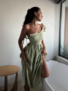 Elegant one-shoulder sage green cotton linen maxi dress with backless tie detail for women.
