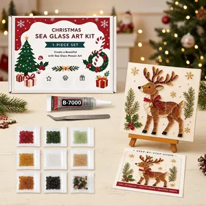 Detailed view of Christmas sea glass art kit with beads, glue, and finished reindeer art
