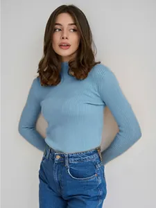 Detail view of women's blue slim fit ribbed mock neck knit long sleeve sweater