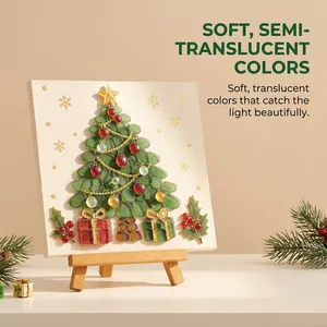 Detail of sea glass Christmas tree art with translucent green and red pieces