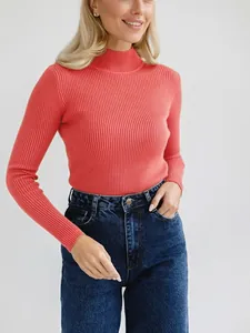 Detailed view of women's coral mock neck ribbed knit sweater in a slim fit style.