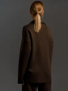 Back view of a dark brown knit sweater and pants set featuring a premium, soft texture.