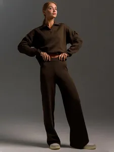 Dark brown knit two-piece set featuring Polo collar sweater and wide-leg trousers