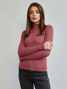 Professional studio shot of a slim-fit ribbed knit semi-high neck sweater in rose pink