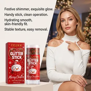 Modella con glitter stick natalizio multicolore applicato su viso e spalla