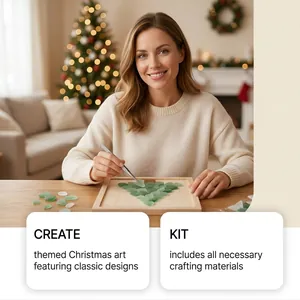 Woman crafting a unique Christmas tree artwork using a DIY sea glass art kit at home