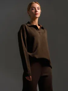 Women's brown two-piece knit set featuring a polo collar sweater and wide-leg pants