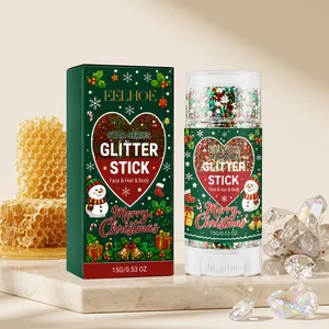 Dettaglio dello stick glitterato natalizio EELHOE con confezione festiva con pupazzo di neve