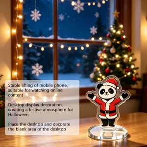 Supporto per cellulare panda di Natale come decorazione con sfondo di luci festive