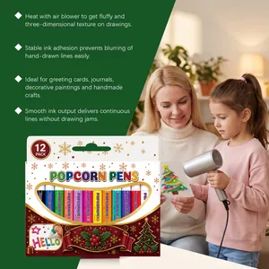 Kind und Erwachsener verwenden Fön für 3D-Effekt mit Weihnachts-Popcorn-Stiften