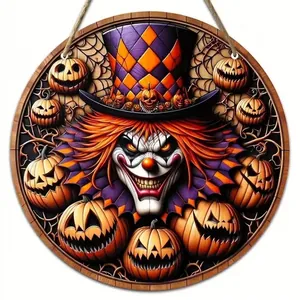 Detail of a circular Halloween wood sign featuring a creepy clown and carved pumpkins.
