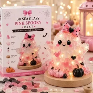 Detail view of the Pink Spooky DIY sea glass kit including ghost character and box packaging